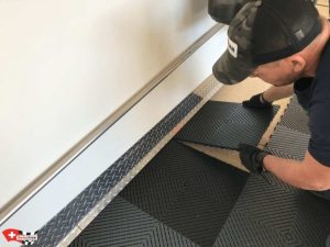installation sol garage
